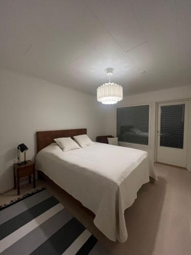 En eller flere senge i et værelse på Villa Blacksmith