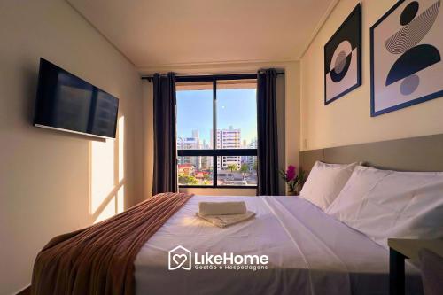 Ένα ή περισσότερα κρεβάτια σε δωμάτιο στο Move Tambaú |||