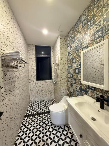 Koupelna v ubytování Pavilion Coffee and Homestay