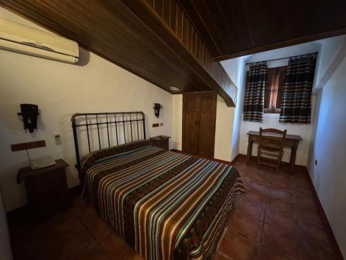 Voodi või voodid majutusasutuse Posada de Jose Mª El Tempranillo toas