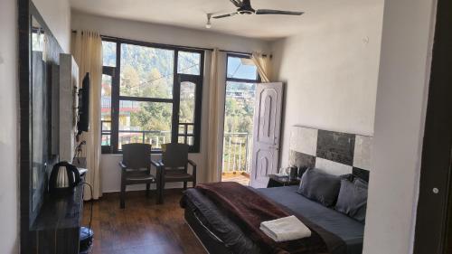 Posezení v ubytování Mcleodganj diaries Guesthouse