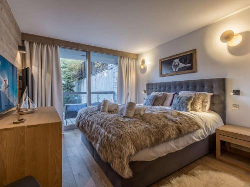 Voodi või voodid majutusasutuse Appartement moderne Courchevel 1550 - 6 pers - Centre village - Parking - WiFi - FR-1-631-233 toas