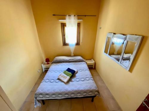 Ένα ή περισσότερα κρεβάτια σε δωμάτιο στο Country House Biobonizio