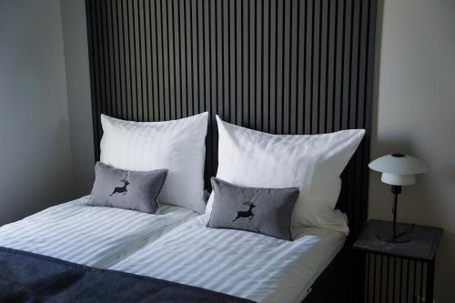 Postel nebo postele na pokoji v ubytování Cozy Apartment With Sauna in the City Center - Lapnest