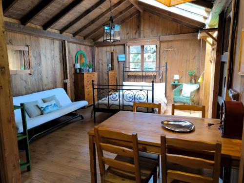 a living room with a table and a couch at Buen Paso in Icod de los Vinos