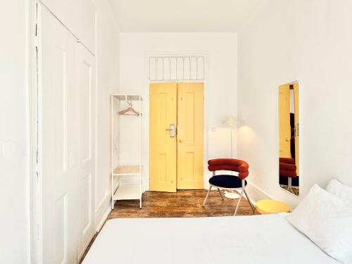 Кровать или кровати в номере Friendly Hills Bairro Alto