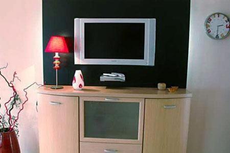 a television on top of a dresser with a lamp at Casa Alhambra 4 6 P in Guía de Isora