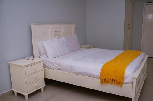 Voodi või voodid majutusasutuse Tical Apartments toas