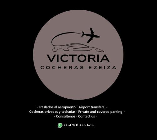 a white logo with a plane flying over the ocean at Cocheras Ezeiza Victoria in Ezeiza
