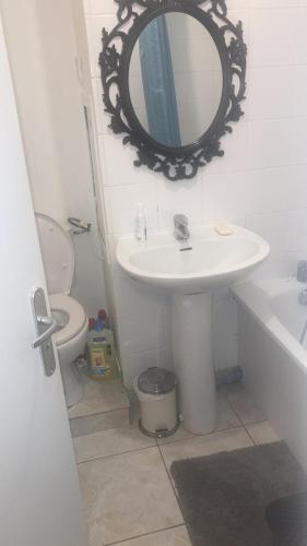 Koupelna v ubytování Room and parllor