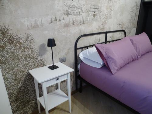 Ένα ή περισσότερα κρεβάτια σε δωμάτιο στο Cà del corso