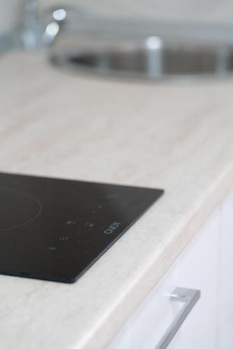 a laptop sitting on top of a counter at MyRoom in Ariano Irpino