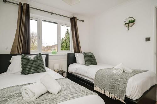 Ένα ή περισσότερα κρεβάτια σε δωμάτιο στο Fowler House 3BR Free WIFI Parking Maidenbouwer