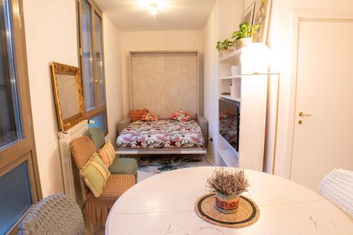 Postel nebo postele na pokoji v ubytování Conti & Moroni House