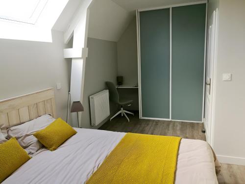 Postel nebo postele na pokoji v ubytování Gite Des Fougères