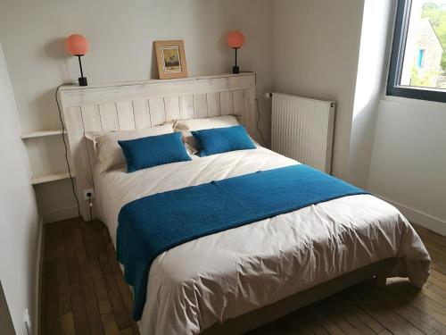 Postel nebo postele na pokoji v ubytování Gite Des Roseaux