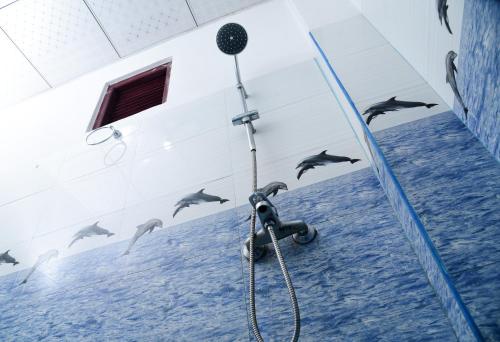 Koupelna v ubytování New Red Rose Ella