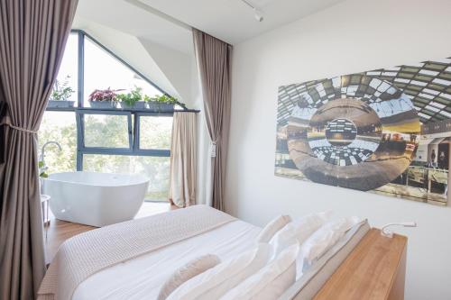 Ένα ή περισσότερα κρεβάτια σε δωμάτιο στο Retreat Apartments