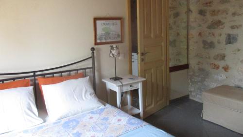 Postel nebo postele na pokoji v ubytování Holiday House In Leonidio With Large Garden