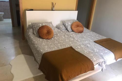 Ένα ή περισσότερα κρεβάτια σε δωμάτιο στο Hotel El Atalaya