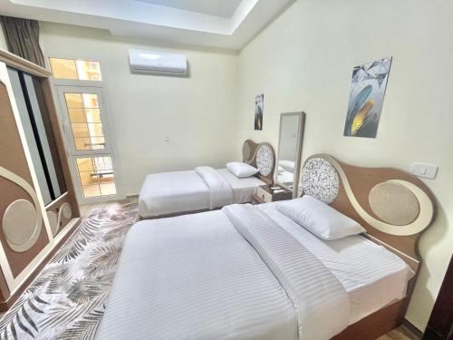 Ένα ή περισσότερα κρεβάτια σε δωμάτιο στο Golden Sweet house Latina