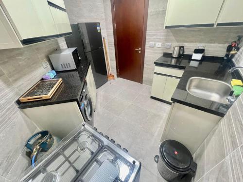 Η κουζίνα ή μικρή κουζίνα στο Golden Sweet house Latina