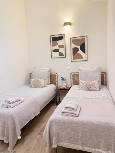 En eller flere senge i et værelse på Appartement Confortable en Provence