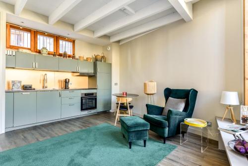 O bucătărie sau chicinetă la Duplex du courreau