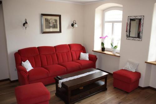 Posezení v ubytování Ferienhaus Schäwisch