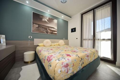 Ένα ή περισσότερα κρεβάτια σε δωμάτιο στο La Dimora di Gea