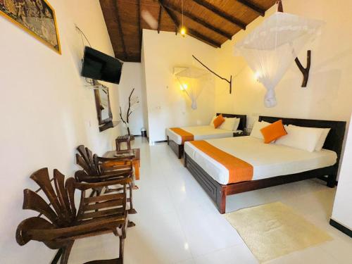 Voodi või voodid majutusasutuse Ora Safari Resort toas