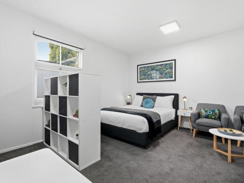 Postel nebo postele na pokoji v ubytování Hobart Cityscape