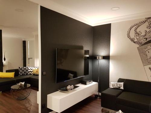 Ένα ή περισσότερα κρεβάτια σε δωμάτιο στο Am Apartments