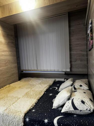 เตียงในห้องที่ Elite Point