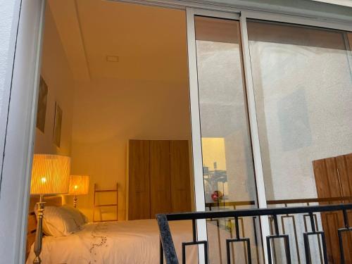 Ένα ή περισσότερα κρεβάτια σε δωμάτιο στο Blueyes