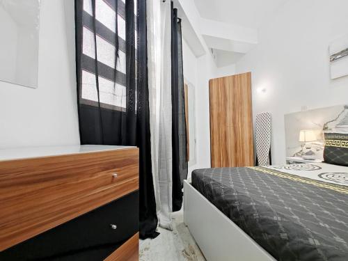 Ένα ή περισσότερα κρεβάτια σε δωμάτιο στο Travelers Nest