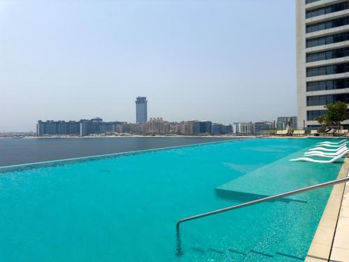 2 BR Palm Ocean View and Private Beach Access