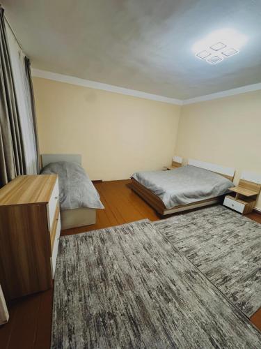 Ένα ή περισσότερα κρεβάτια σε δωμάτιο στο Twin2 House