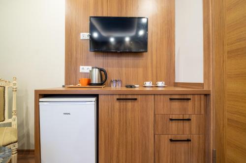 O bucătărie sau chicinetă la Taksim Garden House