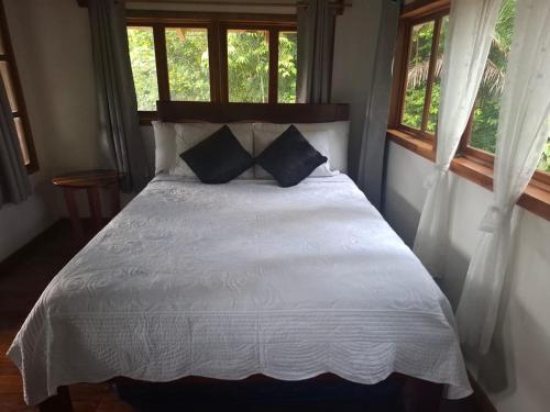 Postel nebo postele na pokoji v ubytování Casita Manakin