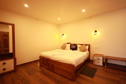 Ένα ή περισσότερα κρεβάτια σε δωμάτιο στο MT'S Villas