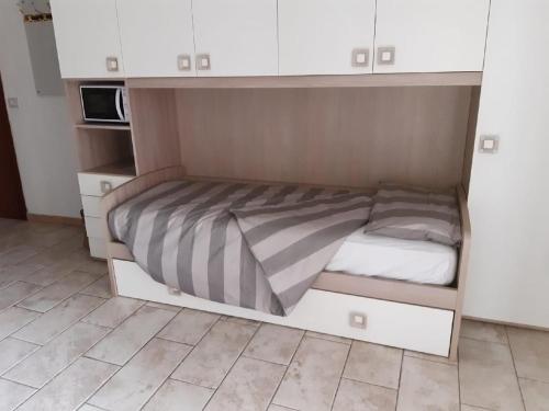 Postel nebo postele na pokoji v ubytování Wohnung In Euroville Mit Gemeinschaftlichem Pool