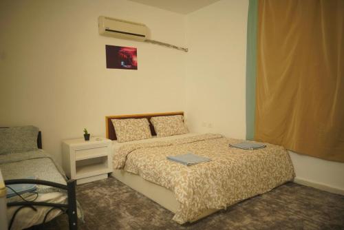 Cama o camas de una habitación en Petra Main Gate Studios