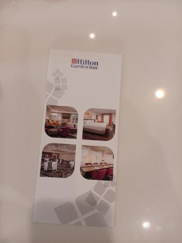a display sign for a bedroom in a room at Hilton Garden Inn in West Columbia