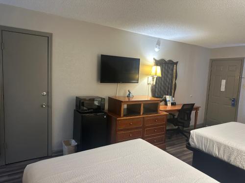 Postel nebo postele na pokoji v ubytování DaysInnByWyndham