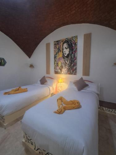 Ένα ή περισσότερα κρεβάτια σε δωμάτιο στο ATON PALACE Luxor