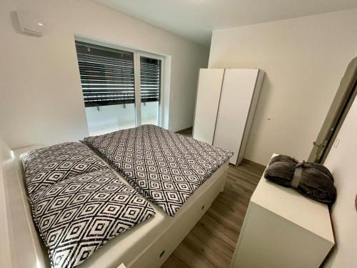 Postel nebo postele na pokoji v ubytování Apartmán Raj