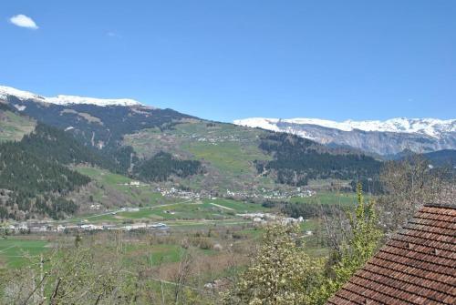 a view of a valley with snow covered mountains at Casa Marili, Das Charmante Ferienhaus in Seewis
