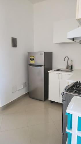 Η κουζίνα ή μικρή κουζίνα στο Bayahibe Mar de Cristal