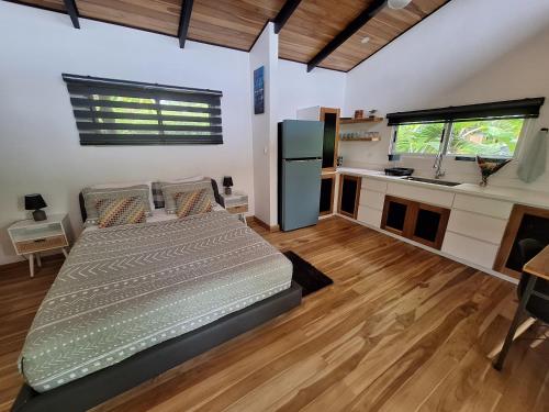 Postel nebo postele na pokoji v ubytování Finca Cacao